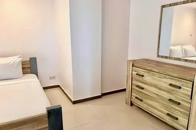 Image de Spacious 3-bedroom apartment in vibrant Dar es Salaam with WiFi Ac Swimming pool