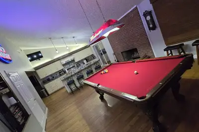 Image de Spacious 4-bedroom house w/ gym, pool, WiFi, 8 miles from Ft. Bennings back gate