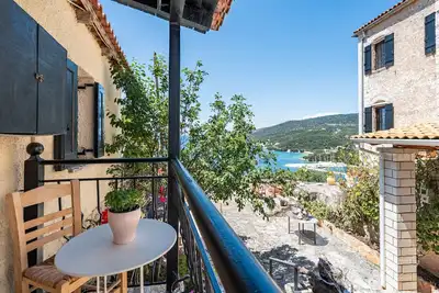 Image de Maison de vacances 'Old Manor Cottage House 4' avec vue sur la mer, Wi-Fi et climatisation