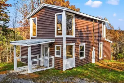 Image de Family Vacation @ 2 Cabins; 2 Hot Tubs, 2 Kitchens, 2 Fireplaces, Mins2Fun