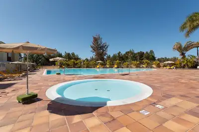 Maison de vacances 'Sunset Meloneras' avec piscine partagée, Wi-Fi et climatisation
