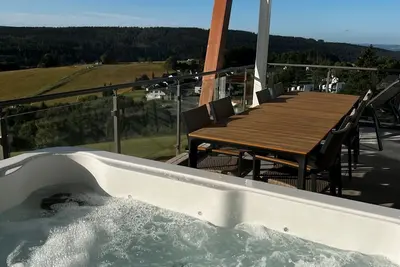 Image de Maison de vacances 'Winterberg D4' avec vue sur les montagnes, terrasse partagée et Wi-Fi