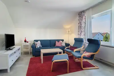 Image de Appartement \"Das Kleine Glück\" avec vue sur les montagnes, terrasse privée et Wi-Fi