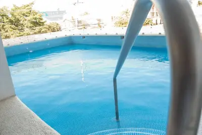 Image de Near the boardwalk and beach, pool by Gpsrentas