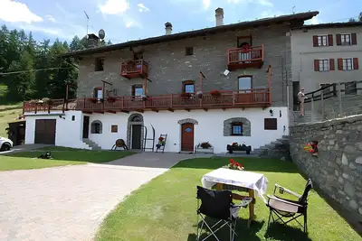 Image de Maison de vacances 'Maison Cerise' avec vue sur les montagnes, jardin privé et Wi-Fi