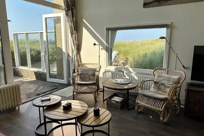 Image de In the middle of the dunes and only 50 m from the beach! The location will enchant you.