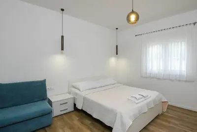 Image de 1-Bedroom Apartment very close to the sea.