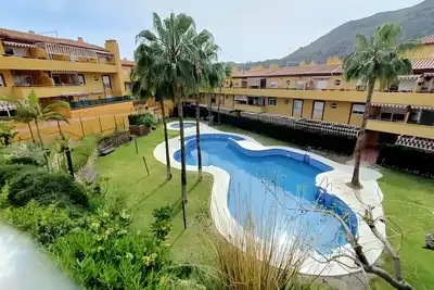 Image de Appartement 'Votre Oasis à Malaga' avec Piscine Commune et Wi-Fi