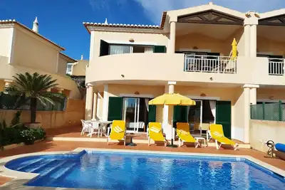 Image de Casa Gemeas in Luz with ocean views, private pool - 10 mins walk to the beach