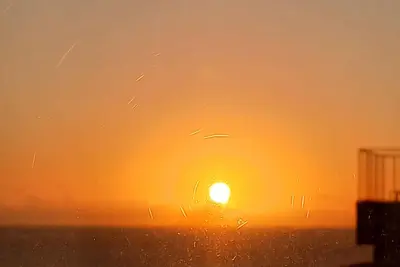 Image de Contemplate the sunset inside the apartment