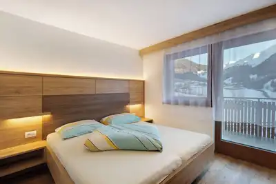 Image de Appartement 'Waldheim Apt 14 15' avec vue sur la montagne, jardin partagé et Wi-Fi