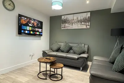 Image de Deluxe 4 Bedroom House with Free Parking