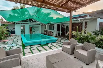 Image de Charming 2-bedroom house with WiFi, Pool, and Ac in enchanting Monterrico.