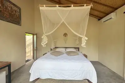 Image de Nestled in the tranquil hills of Kubu Village, Bangli. The private pool villa.