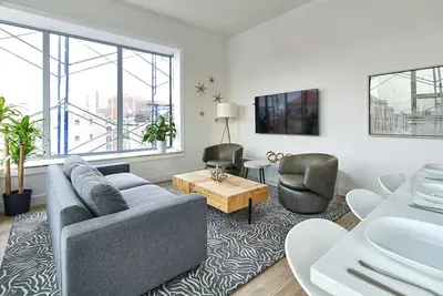 Image de Bright Designer Loft  –  steps from Path to Nyc