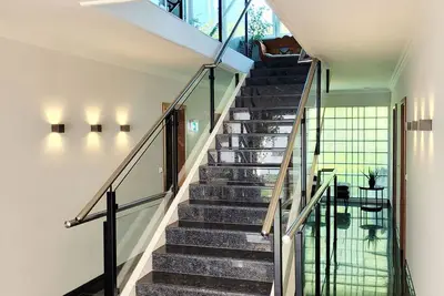 Image de Cozy & modern vacation apartment with garden access - only 7 minutes walk to the