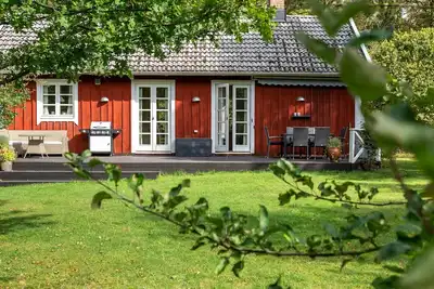Image de Nice holiday home in Hjämlsänga close to lake | Se07001
