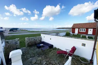 Image de Idyllic house by Torekov harbor with sea view | Se01043