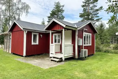 Image de Nice holiday home by the lake Vristulven | Se08049