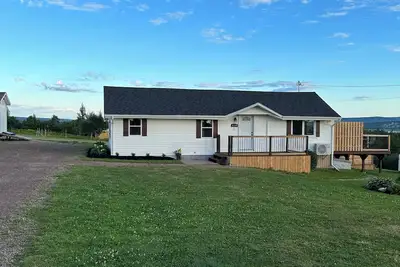Image de Muddy River Retreat - Private backyard with Hot tub