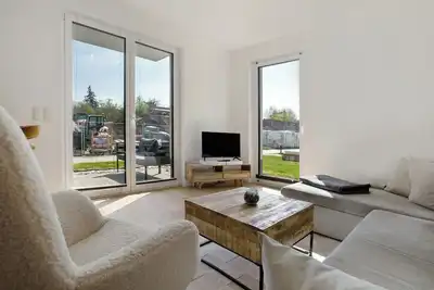 Image de Appartement « Top Loft avec terrasse de jardin » avec terrasse privée, jardin commun et Wi-Fi