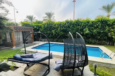 Image de Charming 4-bedroom villa with pool, garden in wonderful sheikh zayed