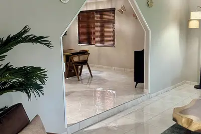 2 Queen Beds & 2 Bunk Beds located 1. 5 miles from the beach.