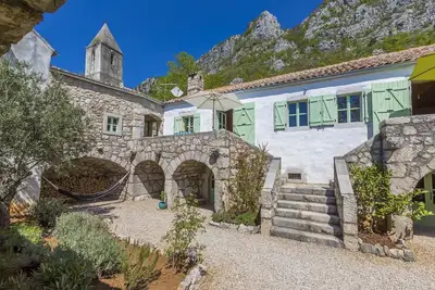 Image de Maison méditerranéenne unique en pierre avec vue sur la mer, espace chillout, vélo, Bbq, WiFi