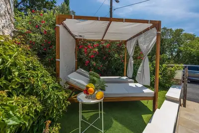 Image de Appartement pittoresque directement sur la plage avec lit-salon, parking privé, climatisation, WiFi