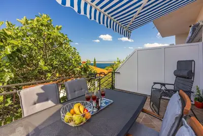 Image de Appartement de rêve à seulement 150 mètres de la plage avec vue sur la mer, chaise longue, barbecue, amis des chiens