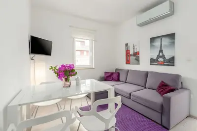 Image de Appartement moderne à seulement 300 mètres de la plage avec terrasse, parking privé, WiFi