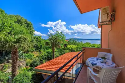 Image de Charmant appartement à seulement 600 mètres de la plage avec vue sur la mer, barbecue au charbon de bois, WiFi