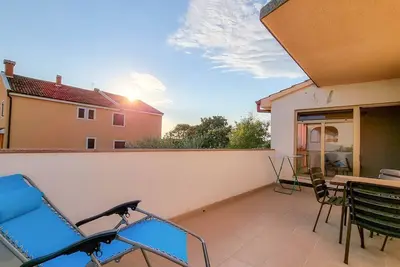 Image de Appartement adapté aux chiens à seulement 550 mètres de la plage avec balcon privé, climatisation, WiFi