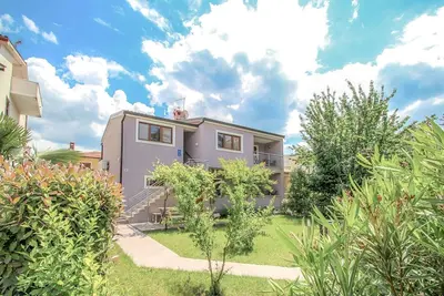 Image de Appartement lumineux à seulement 300 mètres de la plage avec barbecue, parking privé, WiFi