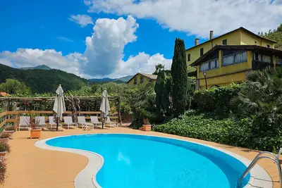 Ferme 'Camere Familiari' avec vue sur la montagne, Wi-Fi et climatisation