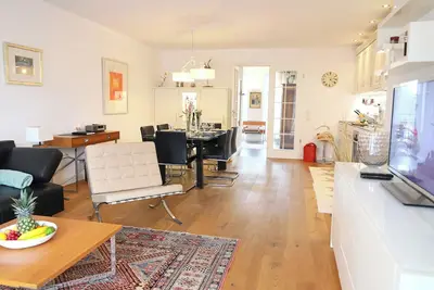 Image de Luxurious vacation apartment with west-facing balcony and beach chair, close to the beach