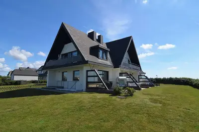 Image de First floor apartment in Wenningstedt - nature view, south-facing terrace and beach chair