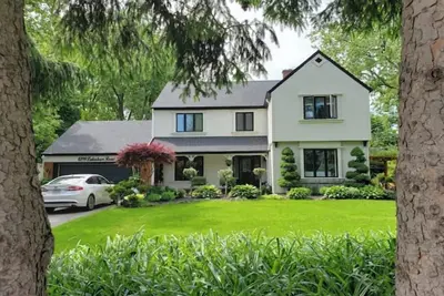 Image de Beautiful Lakeshore Designer home and Tropical gardens for 4 people