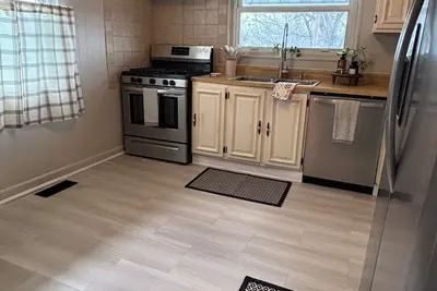 Image de Small Quaint 2-bedroom house in Beckley with WiFi.
