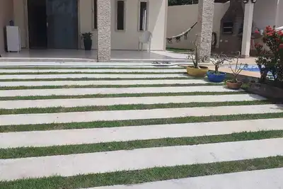 Image de Cozy House in Vilas do Atlântico (8 min walk to the beach)