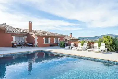 Image de Maison de campagne \"Ca La Munda-Can Cruset\" avec vue sur les montagnes, piscine privée et Wi-Fi