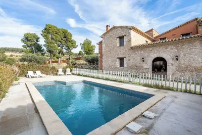 Image de Appartement 'Mas Colom-Can Cruset' avec vue sur les montagnes, piscine privée et Wi-Fi