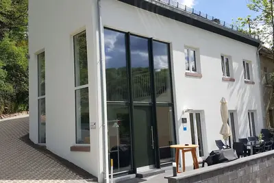 Image de Maison de vacances 'Eifel Atrium' avec terrasse privée et Wi-Fi