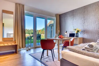 Image de Vacation apartment Kohlmeise in the Wreecher Idyll on Lake Wreechen