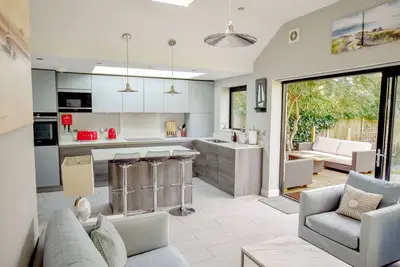 Enjoy a stylish experience at this centrally-located 3 bedroom house.