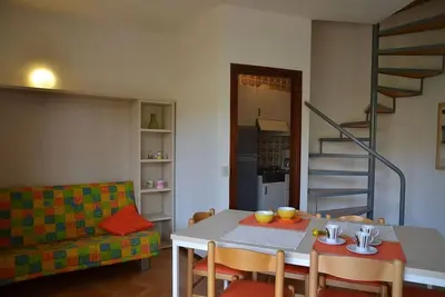 Image de Appartement spacieux avec jardin - Beahost