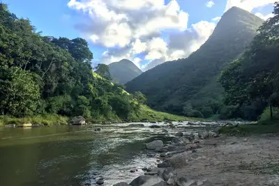 Image de House in the mountains with pool and river.