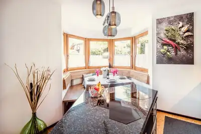 Image de Stadtnestl Apartment - private garden, mountain views & Alpine charm