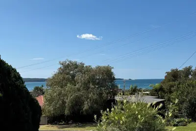 Image de \"Seas the Bay\" -House with water views.