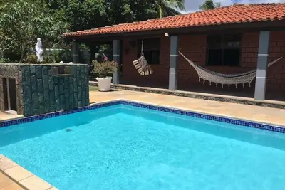 Image de Beach house in Itacimirim, close to Guarajuba and Praia do Forte. Cond. Closed.